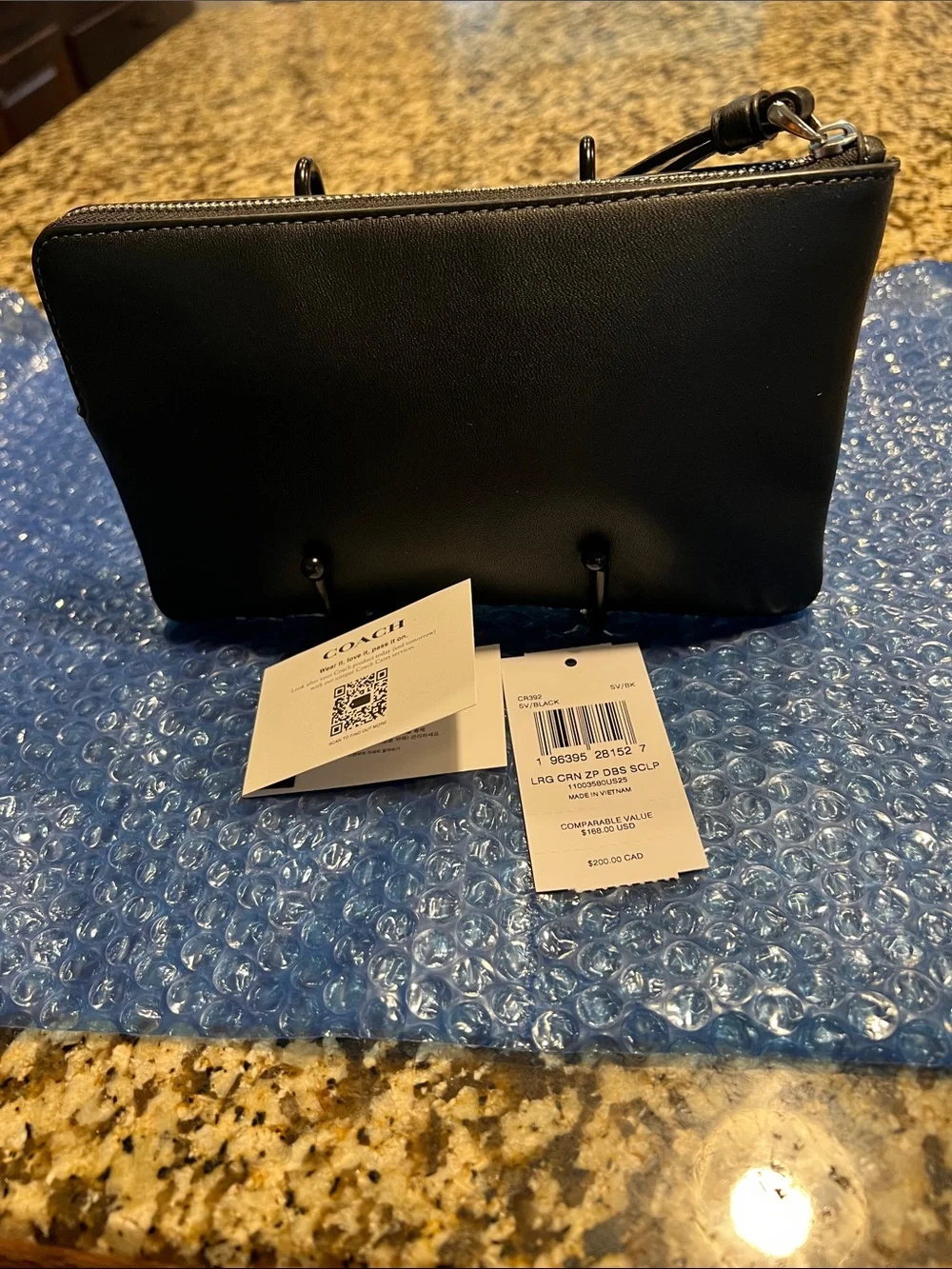 Coach sleek black